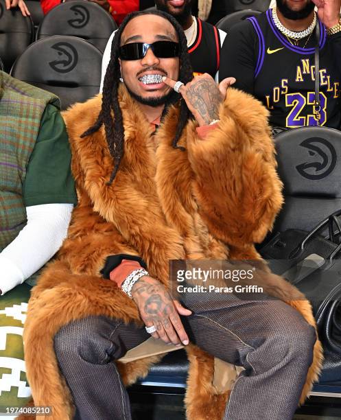 Rapper Quavo attends the game between Los Angeles Lakers and the Atlanta Hawks at State Farm Arena on January 30, 2024 in Atlanta, Georgia. NOTE TO...
