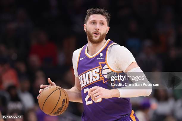 Jusuf Nurkic of the Phoenix Suns handles the ball during the second half of the NBA game at Footprint Center on January 21, 2024 in Phoenix, Arizona....