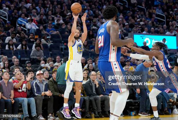 Stephen Curry of the Golden State Warriors shoots a three-point shot against the Philadelphia 76ers during the third quarter at Chase Center on...