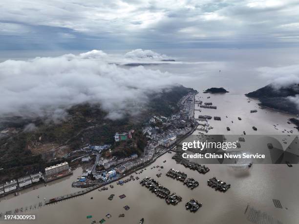 Seascape scenery with fishing boats mooring at Xiaguan port on January 30, 2024 in Wenzhou, Zhejiang Province of China.