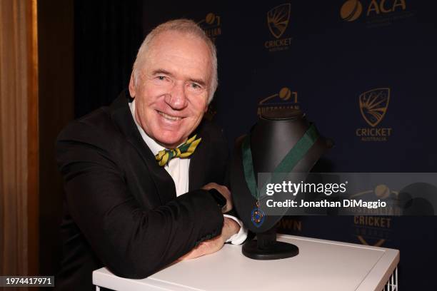 Allan Border poses next to the Allan Border Medal during the 2024 Cricket Australia Awards at Crown Palladium on January 31, 2024 in Melbourne,...