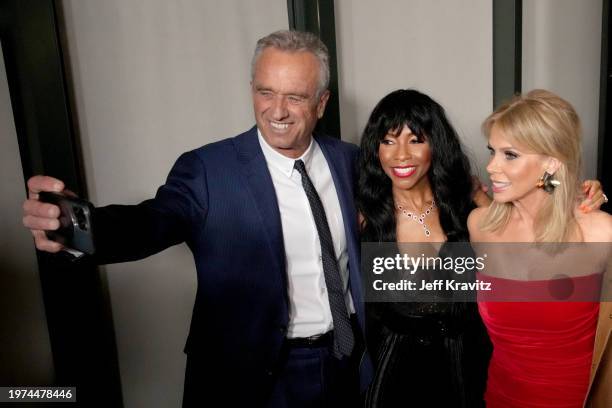 Robert F. Kennedy Jr., Shahidah Omar, and Cheryl Hines attend the Curb Your Enthusiasm Season 12 premiere at DGA Theater Complex on January 30, 2024...