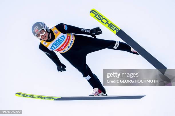 Norway's Jarl Magnus Riiber soars through the air during the competition round for the Individual Gundersen HS109 event of the FIS Men's Nordic...