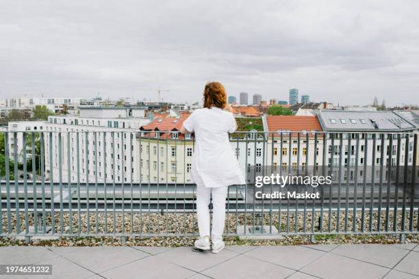 Doctor Railing Doctor Standing Full Length Photos and Premium High Res Pictures ...