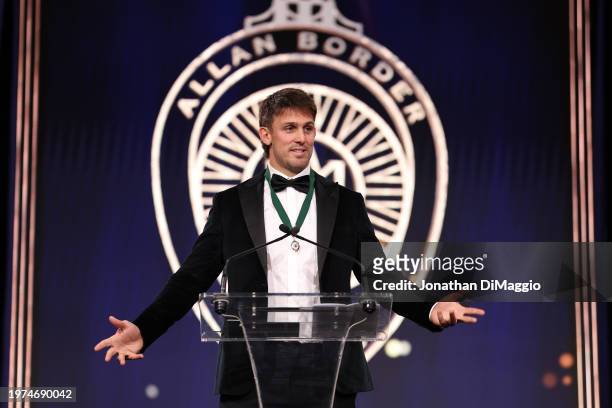 Mitch Marsh speaks on stage after receiving the Allan Border Medal during the 2024 Cricket Australia Awards at Crown Palladium on January 31, 2024 in...