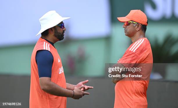 India captain Rohit Sharma talks to coach Rahul Dravid during India nets ahead of the 2nd Test Match at ACA-VDCA Stadium on January 31, 2024 in...