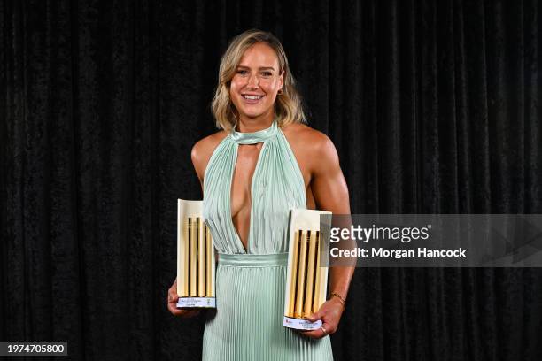 Ellyse Perry poses with the Women’s T20 International Player of the Year and Women’s One Day International Player of the Year award during the 2024...