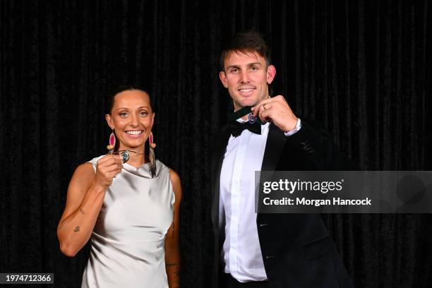 Ashleigh Gardner poses with the Belinda Clark Award and Mitch Marsh poses with the Allan Border Medal during the 2024 Cricket Australia Awards at...