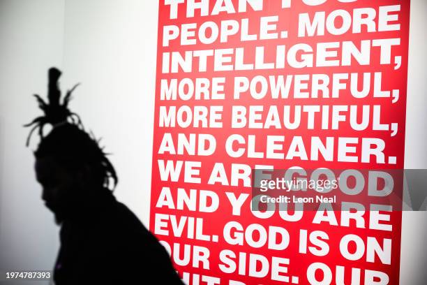Member of staff walks by as "Untitled , 1994" by Barbara Kruger is displayed at the Serpentine South Gallery on January 31, 2024 in London, England....