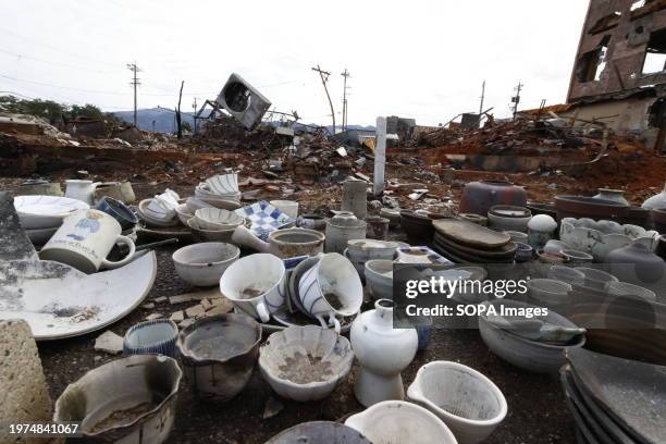 Asaichi Street , one month after it was destroyed by fire in the Noto Peninsula earthquake. Local residents' bowls, small plates, and other tableware...