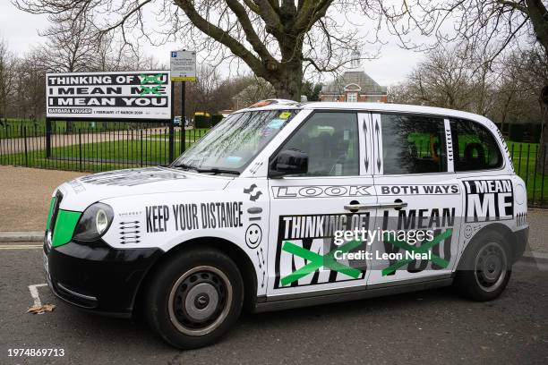 Branded London taxi, promoting the "Thinking Of You I Mean Me I Mean You" exhibition of work by Barbara Kruger is seen outside the Serpentine South...