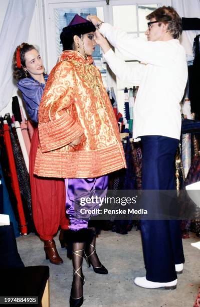 Designer Yves Saint Laurent, along with Loulou de la Falaise, previews his Fall 1977 Ready to Wear collection, in Paris, France.
