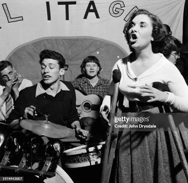 Harmonicist Percy Partridge, drummer Charlie Jones, guitarist Christina Gefftr, and singer Eileen Kiggins during a performance by the jazz band...