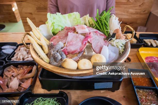 grill thai bbq (mookata) or korean style with many different types of food. with fresh food ingredients - smokey bacon stock pictures, royalty-free photos & images