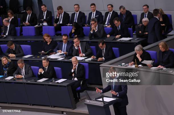 Friedrich Merz, head of the opposition German Christian Democrats , speaks during debates about the 2024 federal budget at the Bundestag on January...