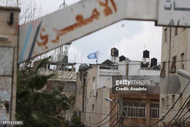 The UN flag flies on the roof of the UNRWA school at al-Am'ari Refugee Camp after funding cuts to UNRWA in Ramallah, West Bank on February 03, 2024....