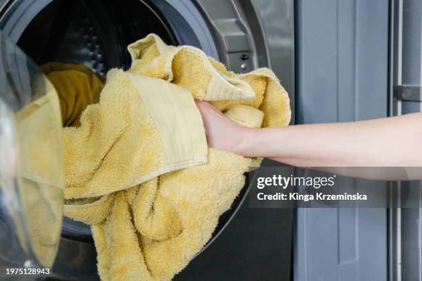 yellow towel - smelly laundry stock pictures, royalty-free photos & images