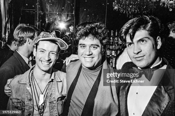 Spanish film director Pedro Almodóvar , with unidentified others, at the Roxy nightclub, New York, New York, March 24, 1990.