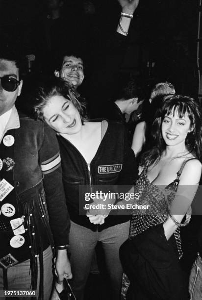 Portrait of nightclub promotor and 'Club Kid' Susan Anton , with unidentified others, at the Love Machine nightclub, New York, New York, April 3,...