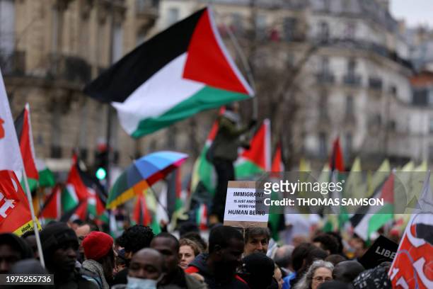 People march in support of Palestinians and a permanent ceasefire as fighting continues between Israel and the Palestinian Hamas group in the Gaza...