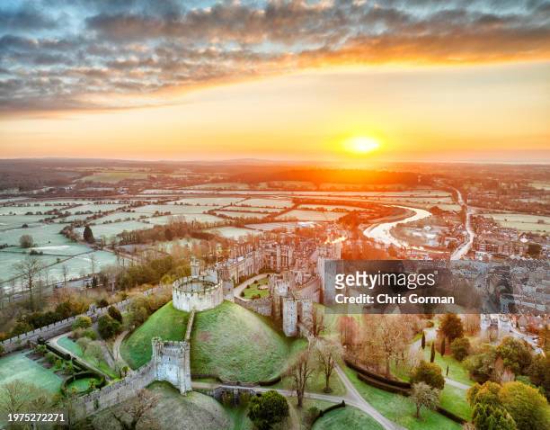 The sun breaks the horizon at a frost covered Arundel Castle in West Sussex this morning . Colder weather is expected next week with the chance of...