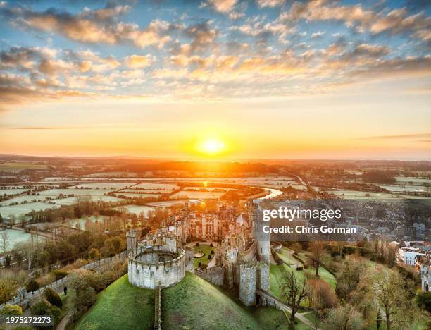 The sun breaks the horizon at a frost covered Arundel Castle in West Sussex this morning . Colder weather is expected next week with the chance of...