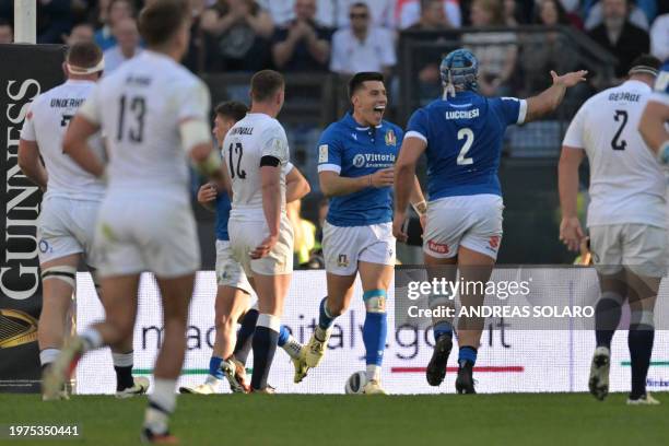 Italy's fullback Tommaso Allan celebrates after scoring a try during the Six Nations rugby union tournament match between Italy and England at the...