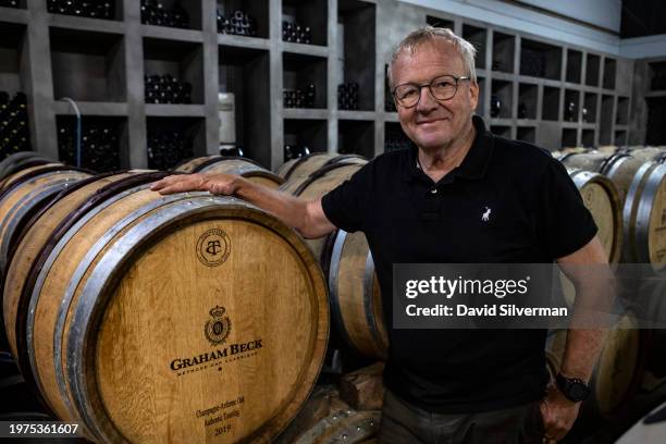 Winemaker Pieter Ferreira poses in the barrel cellar where he ages wine components that go into Cap Classique sparkling wine at the Graham Beck...