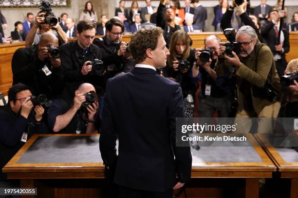 Mark Zuckerberg, CEO of Meta, arrives to testify during a Senate Judiciary Committee hearing at the Dirksen Senate Office Building on January 31,...