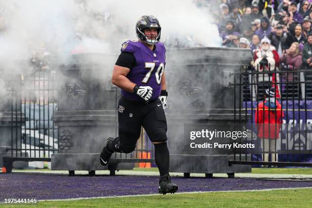 Kevin Zeitler of the Baltimore Ravens runs out of the tunnel prior to the AFC Championship NFL football game against the Kansas City Chiefs at M&T...