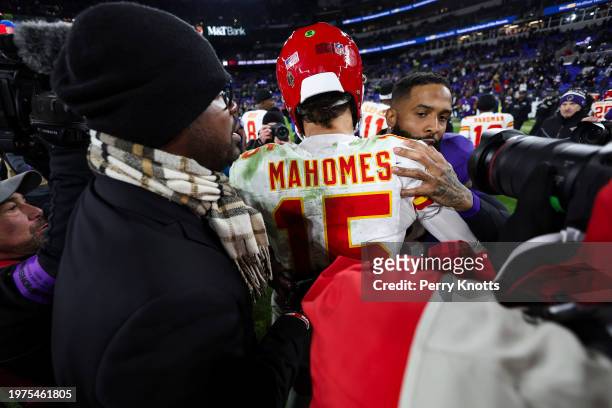Patrick Mahomes of the Kansas City Chiefs talks with Odell Beckham Jr. #3 of the Baltimore Ravens after the AFC Championship NFL football game at M&T...