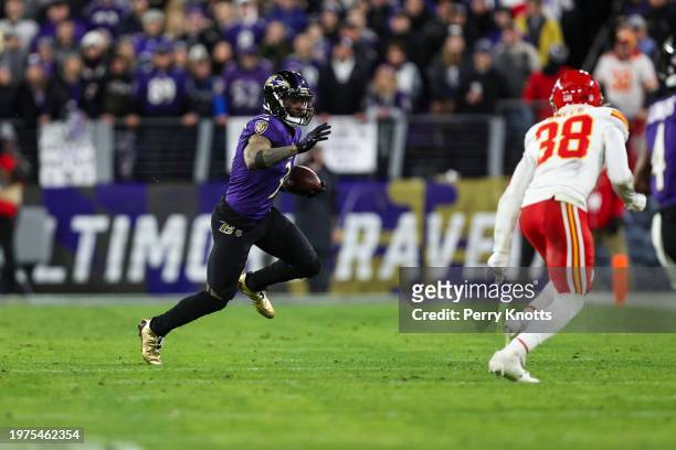Odell Beckham Jr. #3 of the Baltimore Ravens runs the ball during the AFC Championship NFL football game against the Kansas City Chiefs at M&T Bank...
