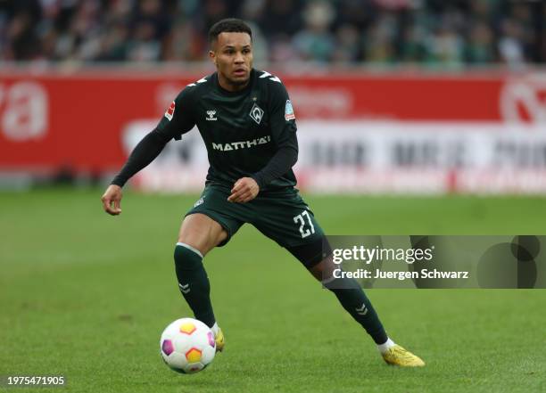 Felix Agu of Bremen controls the ball during the Bundesliga match between 1. FSV Mainz 05 and SV Werder Bremen at MEWA Arena on February 3, 2024 in...