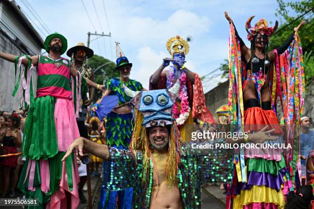 Revellers take part in the "Ceu a Terra" street carnival "bloco" group parade at the Santa Teresa neighborhood in Rio de Janeiro, Brazil on February...