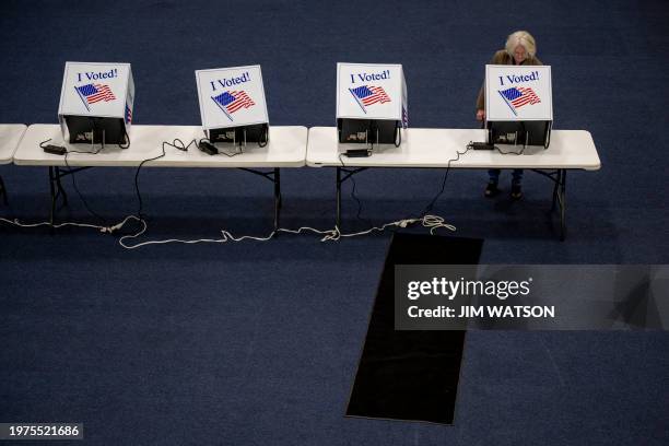 Woman votes at the Royal Missionary Baptist Church polling location in North Charleston, South Carolina, on February 3 during the democratic primary....