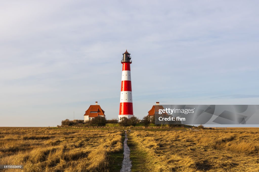 Travel destination: Way to Westerhever lighthouse (Schleswig-Holstein, Germany)
