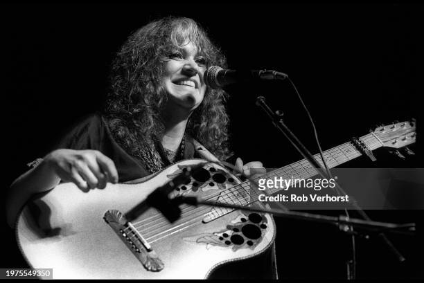 Melanie performs on stage at Folk Festival, de Doelen, Rotterdam, Netherlands, 4th September 1982. She is playing an Ovation acoustic guitar.