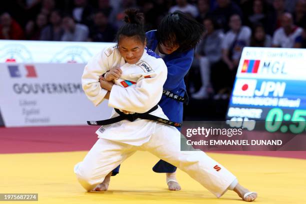 Mongolia's Gankhaich Bold fights against Japan's Kirari Yamaguchi in the women's -63kg bronze medal bout during the Paris Grand Slam judo tournament...