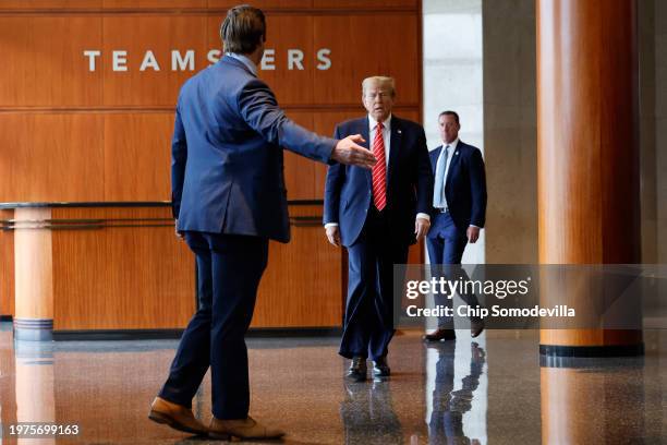 Republican presidential candidate and former U.S. President Donald Trump walks to a podium to deliver remarks after meeting with leaders of the...