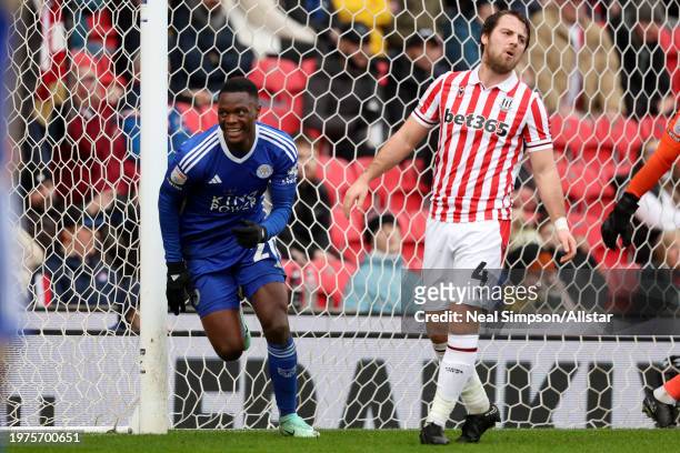 Patson Daka of Leicester City celebrates 1st goal with Ben Pearson of Stoke City looking dejected during the Sky Bet Championship match between Stoke...