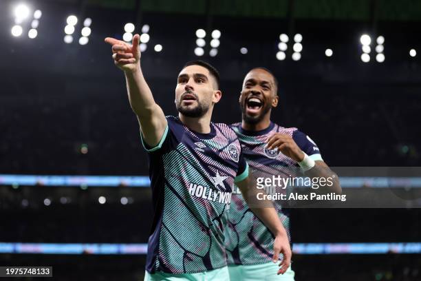 Neal Maupay of Brentford celebrates scoring his team's first goal during the Premier League match between Tottenham Hotspur and Brentford FC at...