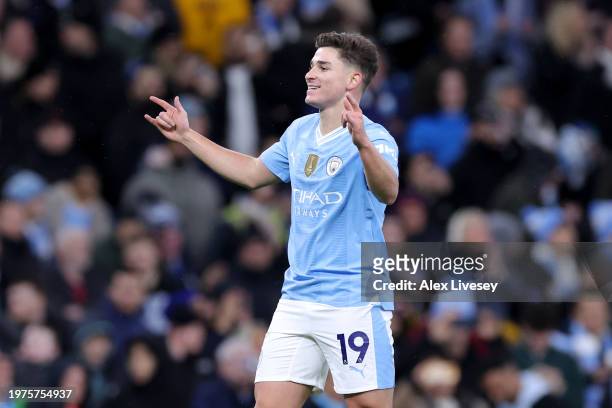 Julian Alvarez of Manchester City celebrates scoring his team's first goal during the Premier League match between Manchester City and Burnley FC at...