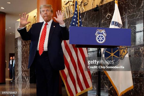 Republican presidential candidate and former U.S. President Donald Trump holds up his hands after being asked about them by reporters at the...