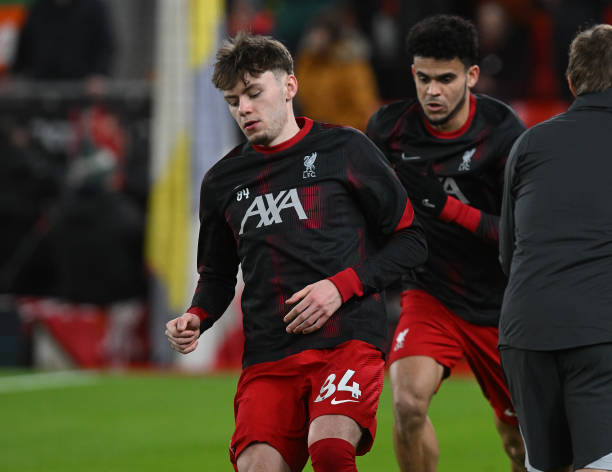 Conor Bradley of Liverpool during the warm-up before the Premier League match between Liverpool FC and Chelsea FC at Anfield on January 31, 2024 in...