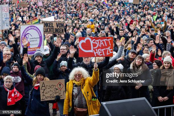 People gather to protest against right-wing extremism and the far-right Alternative for Germany political party on February 03, 2024 in Dresden,...