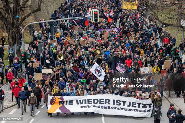 People gather to protest against right-wing extremism and the far-right Alternative for Germany political party on February 03, 2024 in Dresden,...