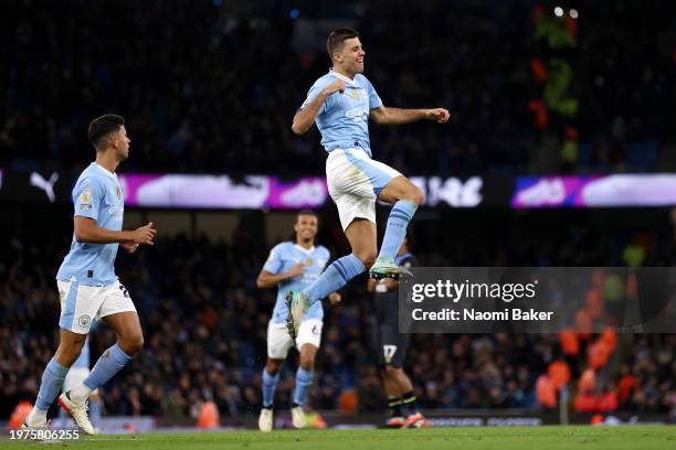 Rodri of Manchester City celebrates scoring his team's third goal during the Premier League match between Manchester City and Burnley FC at Etihad...