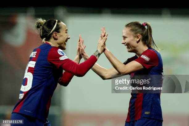 Caroline Graham Hansen of FC Barcelona celebrates scoring her team's first goal with teammate Lucy Bronze during the UEFA Women's Champions League...