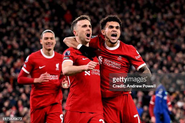 Diogo Jota of Liverpool celebrates after scoring the opening goal during the Premier League match between Liverpool FC and Chelsea FC at Anfield on...