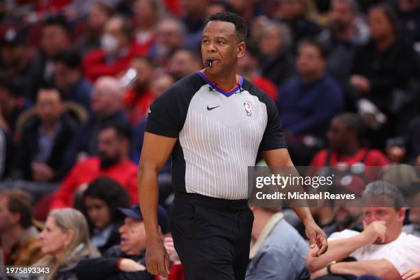 Referee Sean Wright looks on during the first half between the Chicago Bulls and the Toronto Raptors at the United Center on January 30, 2024 in...